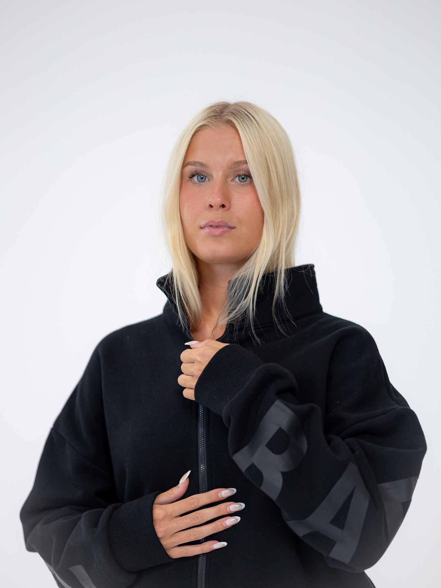 The Oversized Zip-Up in Black by Barre Trash