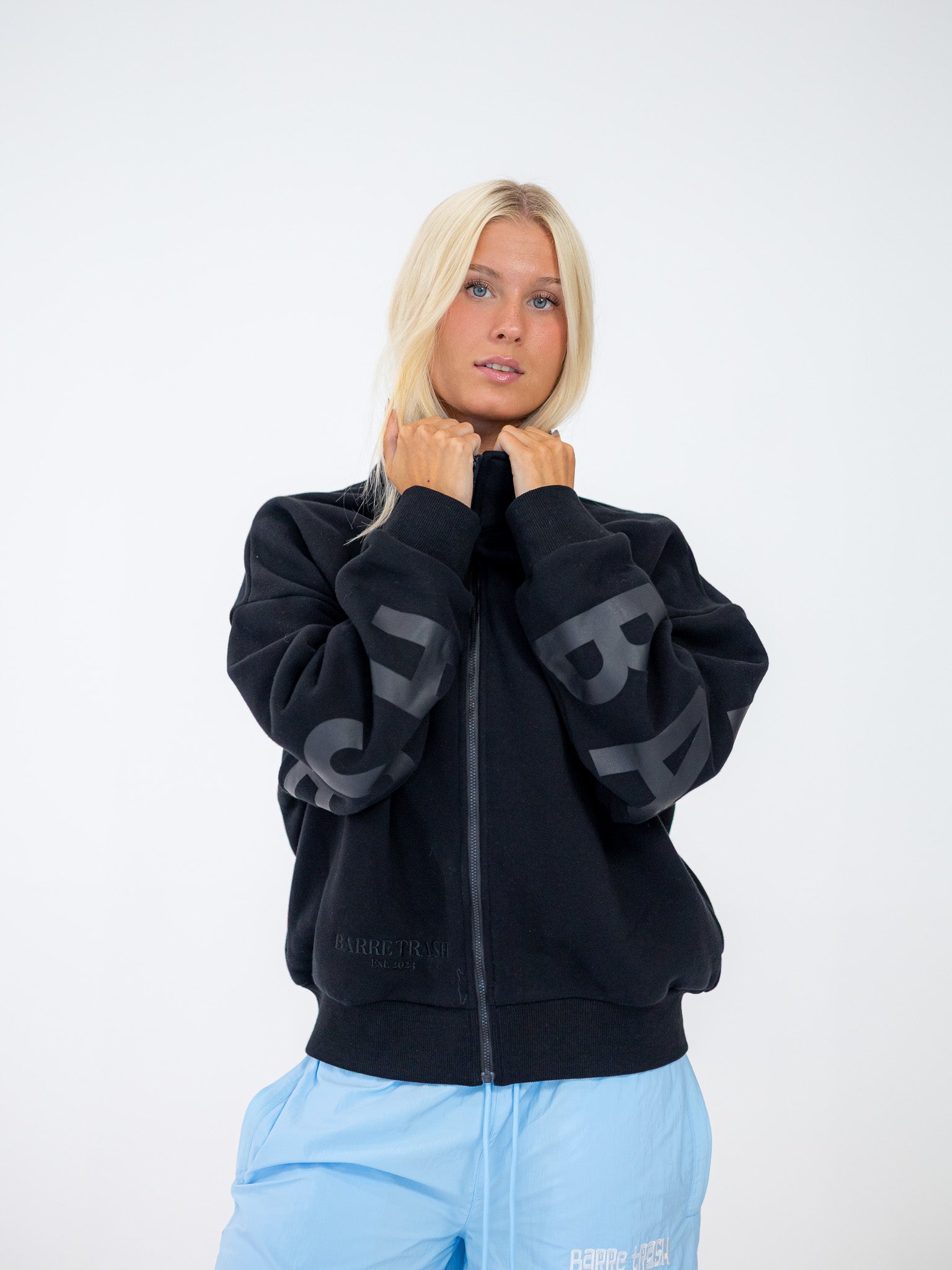 The Oversized Zip-Up in Black by Barre Trash