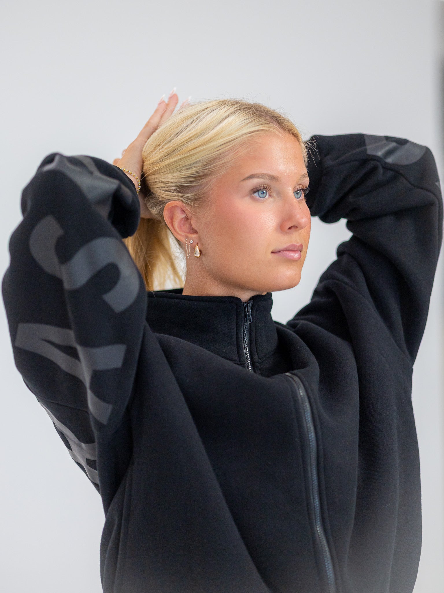 The Oversized Zip-Up in Black by Barre Trash