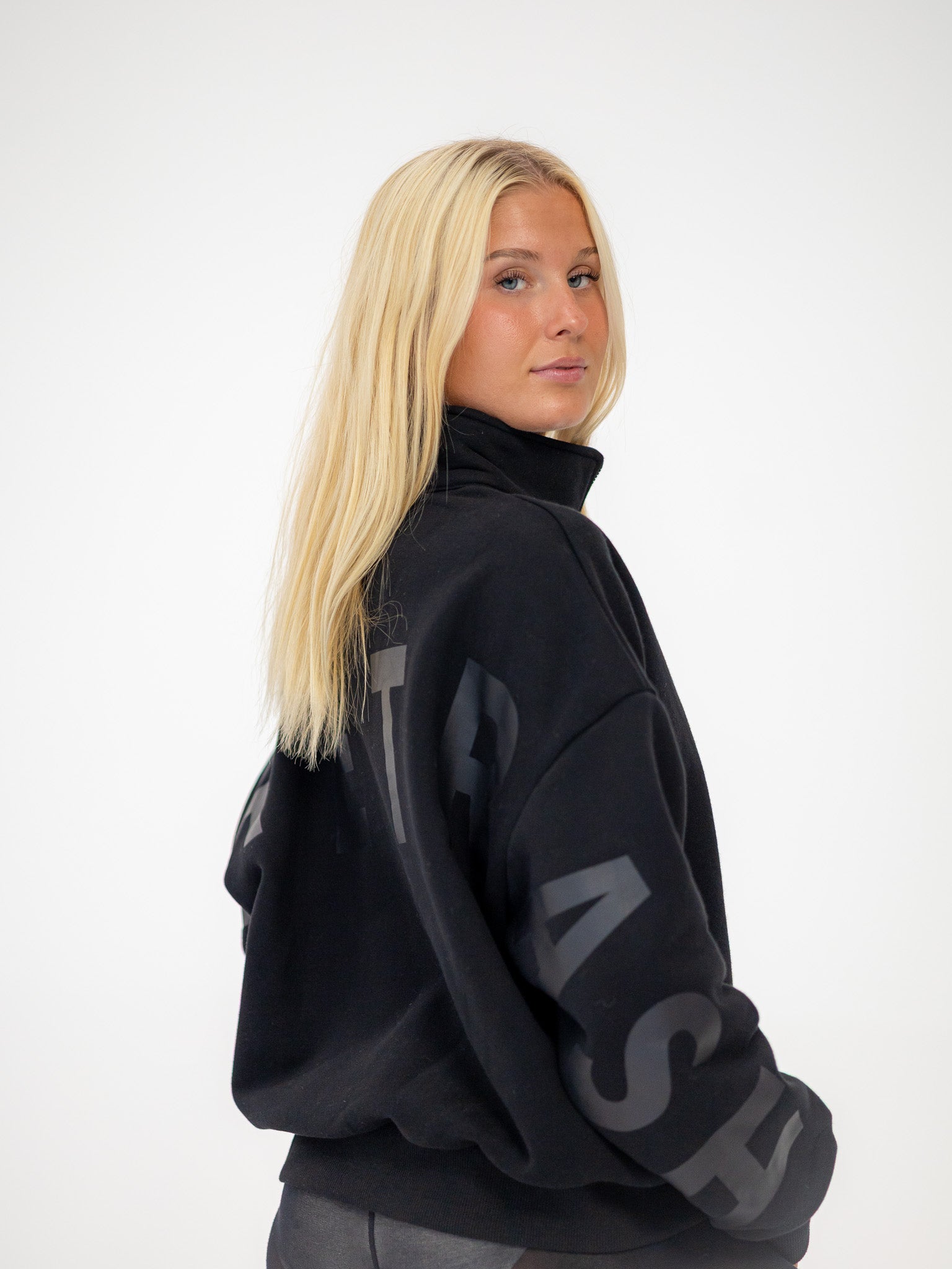 The Oversized Zip-Up in Black by Barre Trash